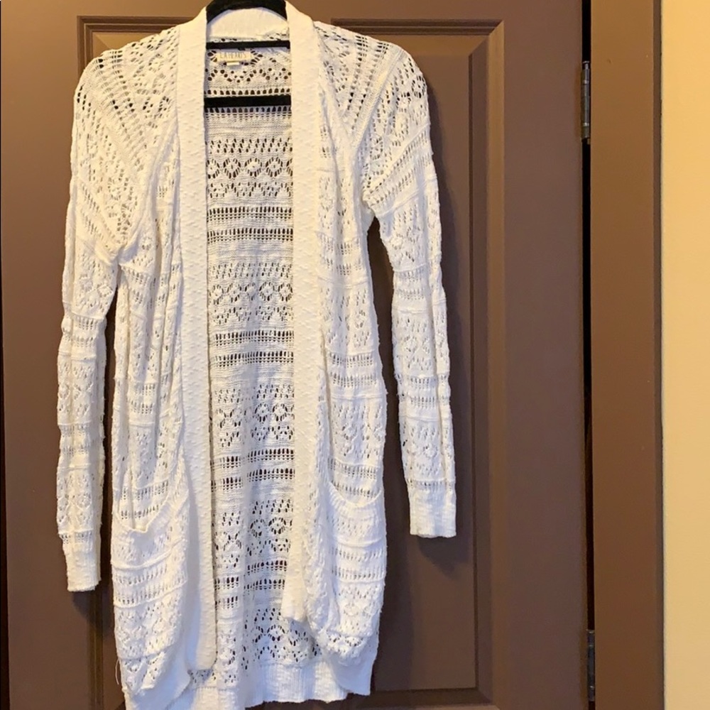 Long white cardigan.